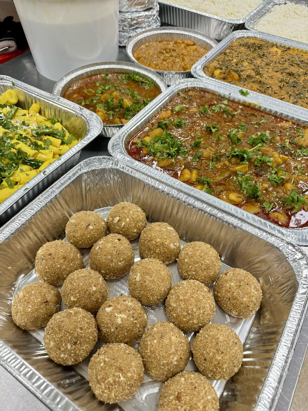 Catering trays with laddu and sides