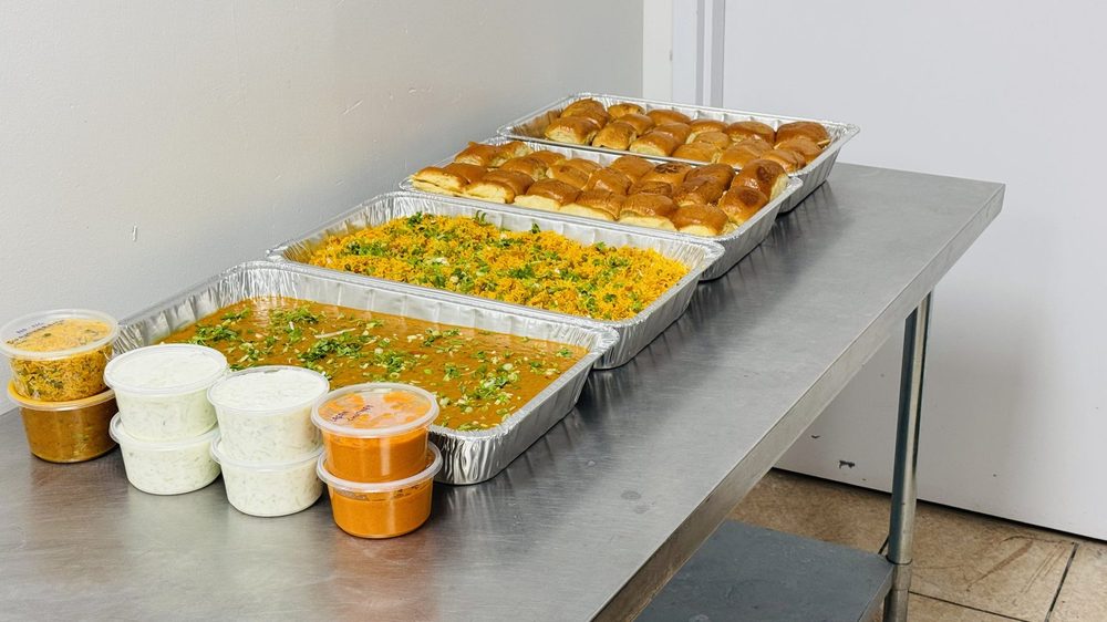 Catering trays lined up in the kitchen