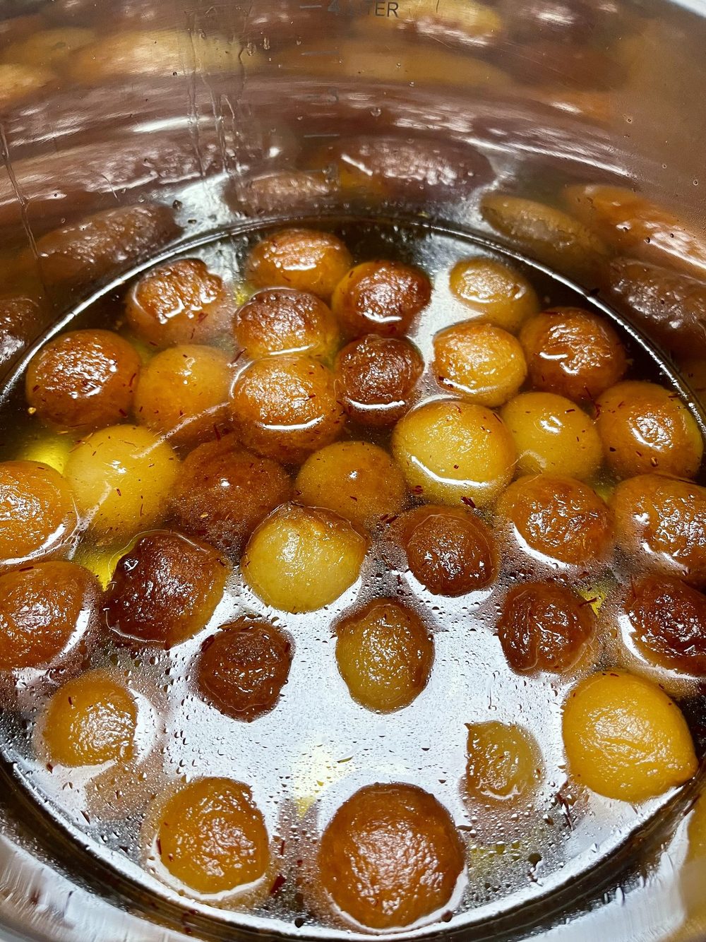 Gulab jamun resting in syrup