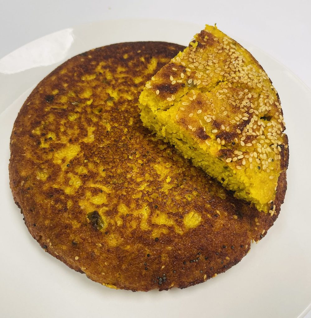 Handvo, baked golden and sliced