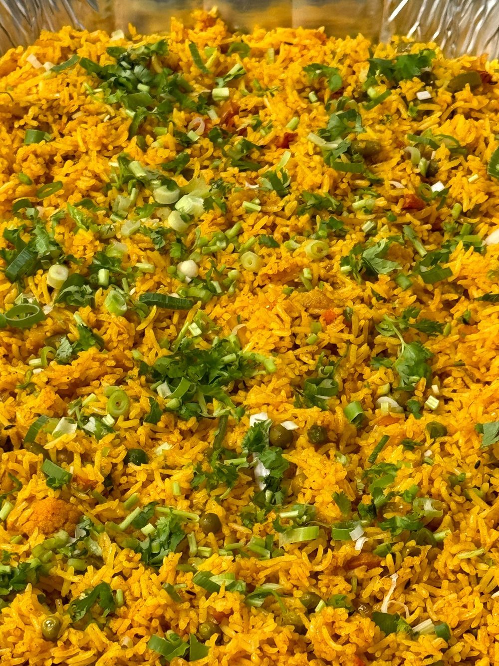 Yellow khichdi, garnished and ready