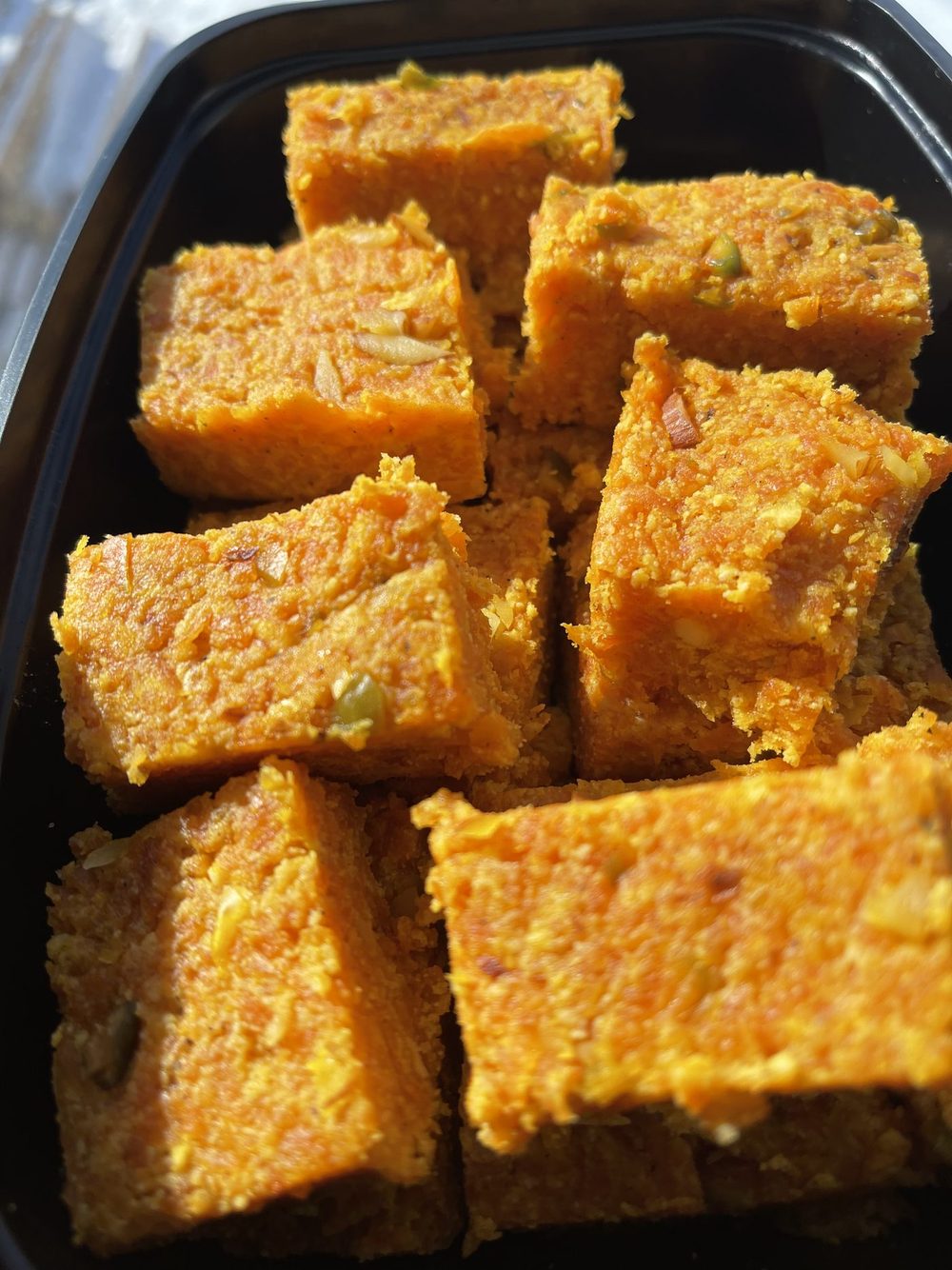 Magas barfi, cut into squares