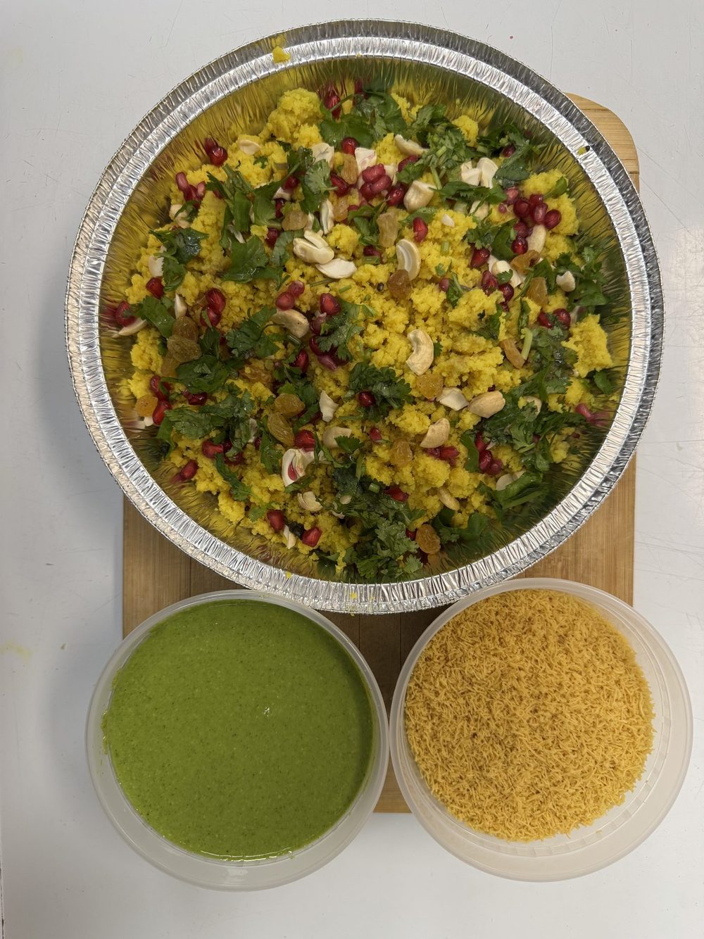 Poha served with chutney and sev